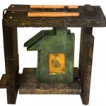 Small House. Wood, metal, wax. 33 x 33 x x 14 cms.